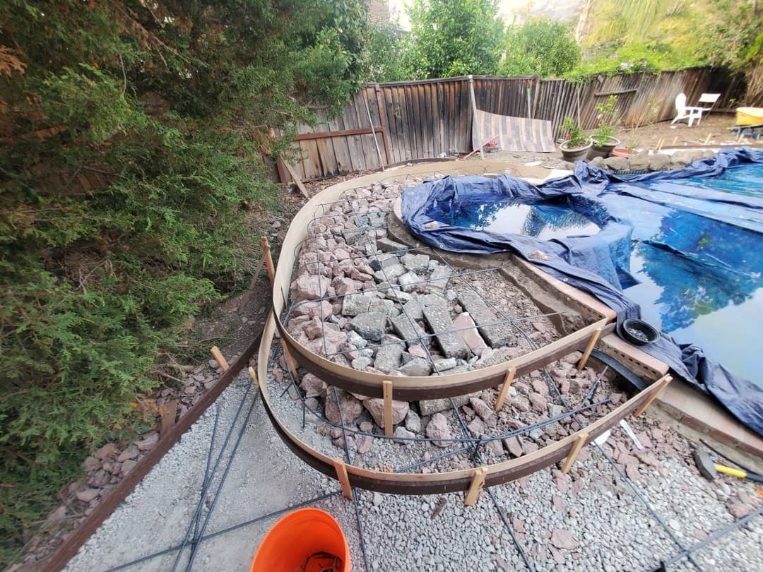 picture of a concrete walkway being prepped to be filled with concrete